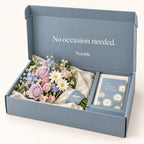A Lovely Detour bouquet in its dusty blue Notable box