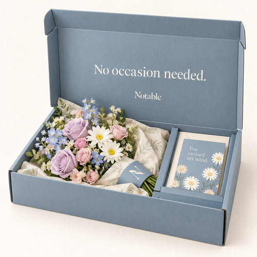 A Lovely Detour bouquet in its dusty blue Notable box
