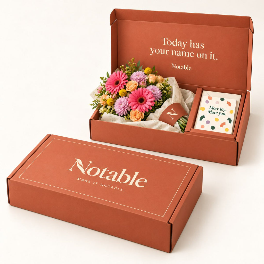 Confetti Club bouquet in its terracotta Notable box, closed box and open box