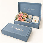 Little Delight bouquet in its dusty blue Notable box, closed box and open box