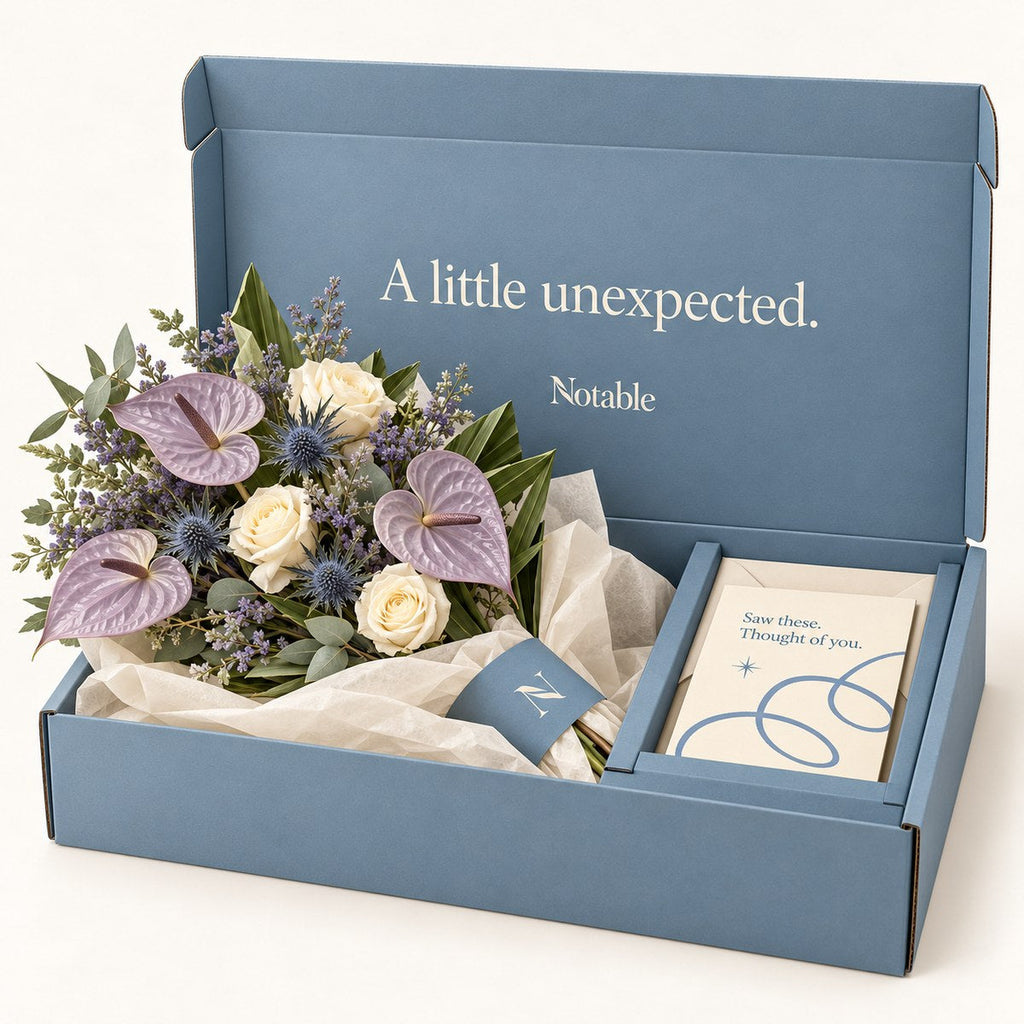 Out of the Blue bouquet in its dusty blue Notable box