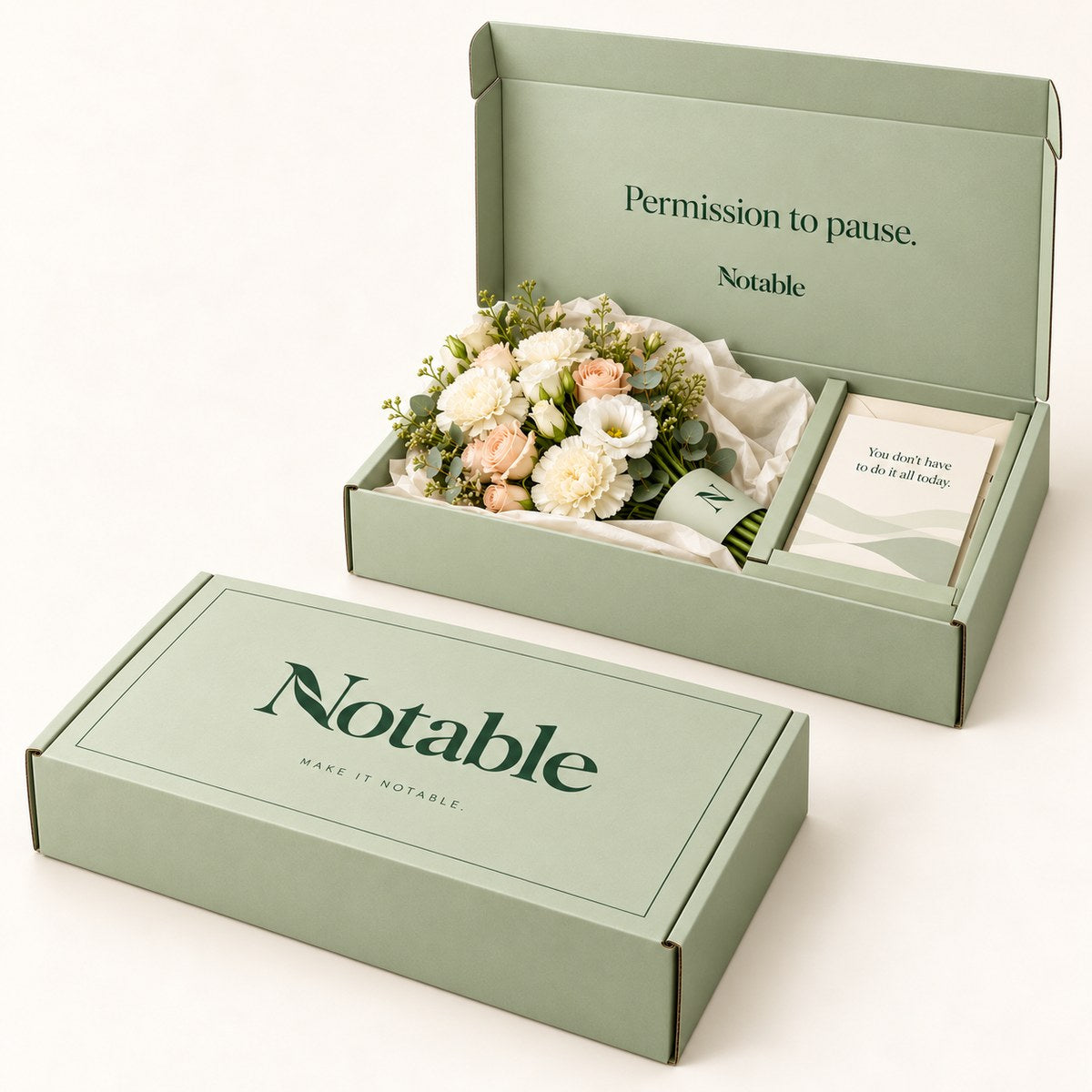 Soft Pause bouquet in its sage Notable box, closed box and open box