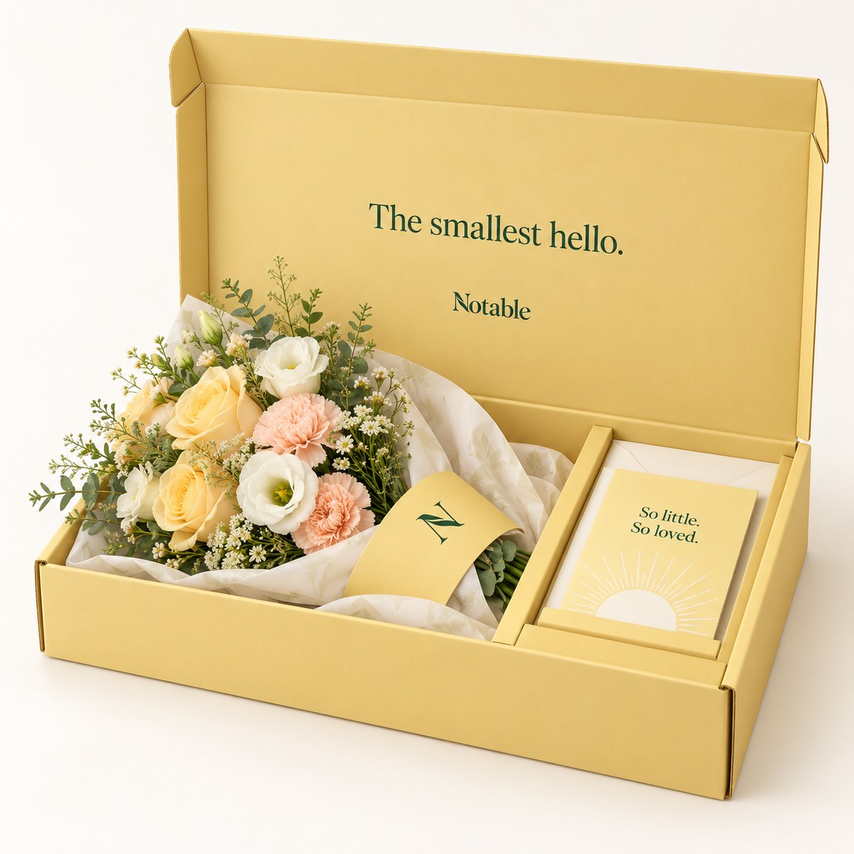 Tiny Sunrise bouquet in its butter Notable box